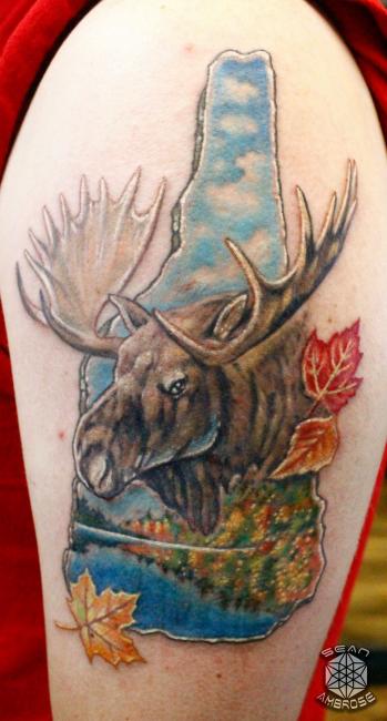 Custom realistic colorful New Hampshire Moose Mountain tattoo by Sean Ambrose of Arrows and Embers Tattoo in Concord, New Hampshire (NH). Sean specializes in realism and surrealism custom Tattoos. He has been awarded as the Best Tattoo Artist in NH multiple years from multiple publications, and also won handfuls of awards for his tattoos and art.